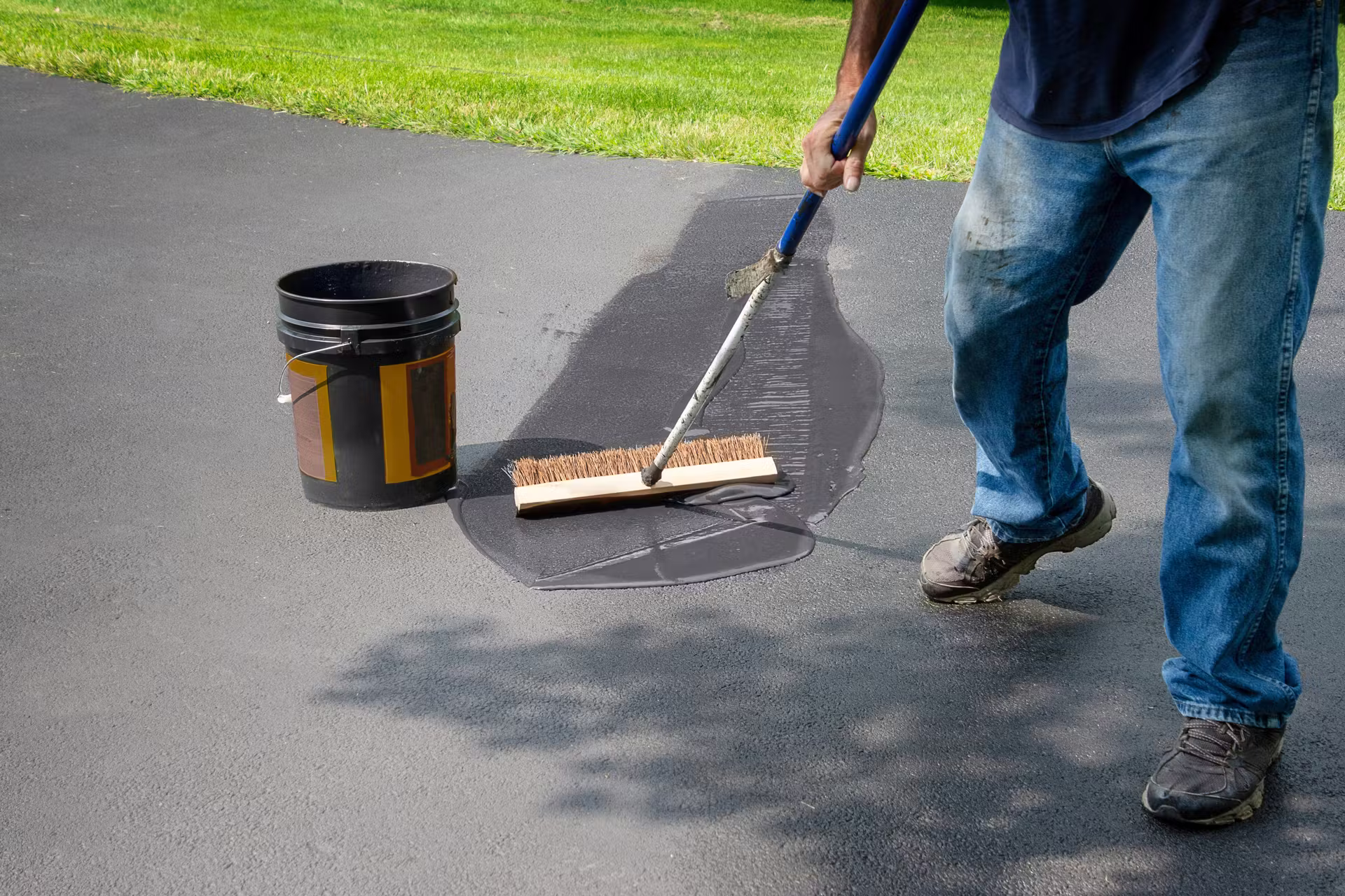 Driveway sealcoating